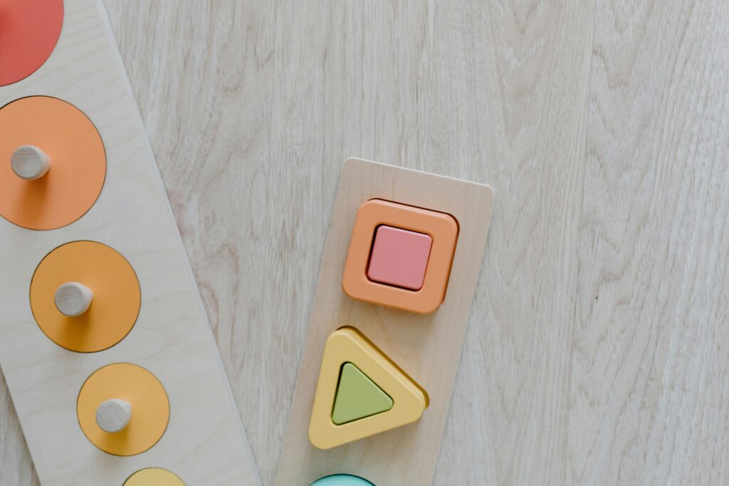 top view of a wooden puzzle to teach shapes to toddlers